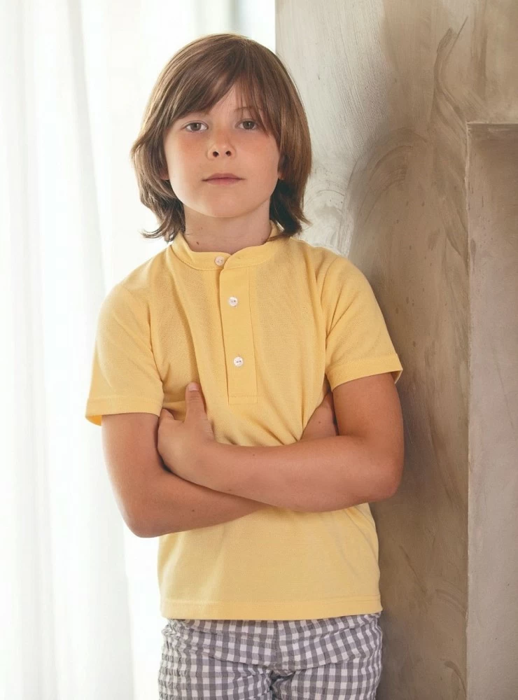 Set for boy. Yellow polo shirt and Gray Vichy pants.