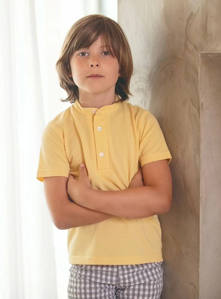 Set for boy. Yellow polo shirt and Gray Vichy pants.