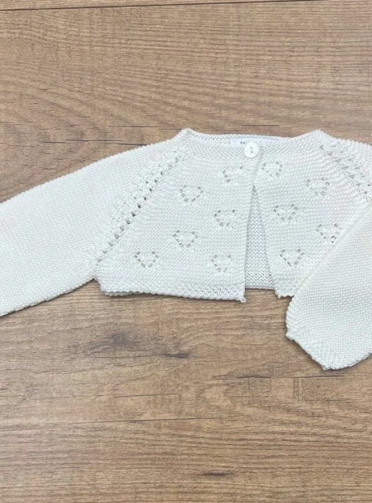 Short beige yarn jacket. special ceremony