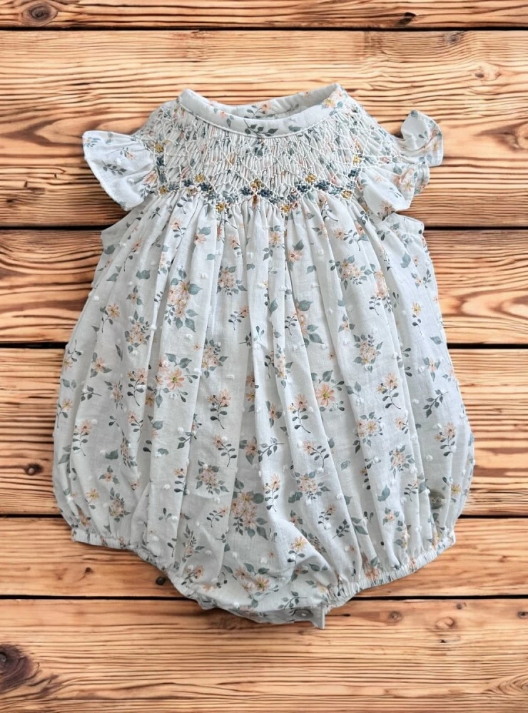 Smock-stitch romper for girls from the Lucca collection