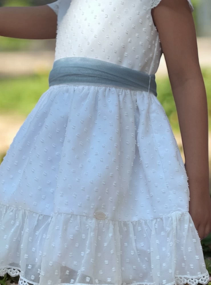Special white plumeti dress for a ceremony