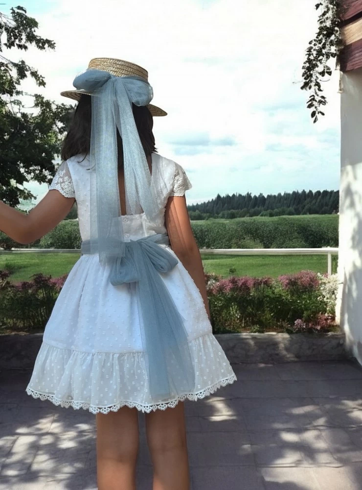 Special white plumeti dress for a ceremony