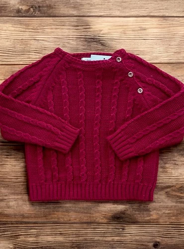 Two-tone boy's sweater. Cable knit.