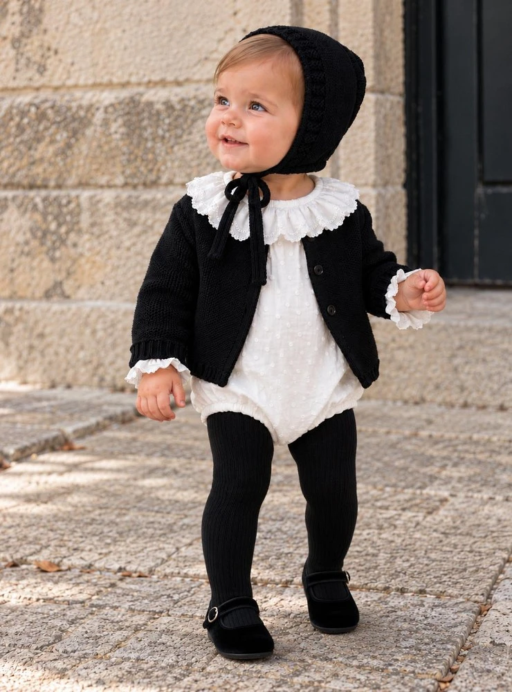 Unisex baby set in 'ebony black', featuring a plumeti bodysuit and a bonnet