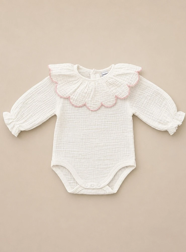Unisex chambray bodysuit with a scalloped neckline