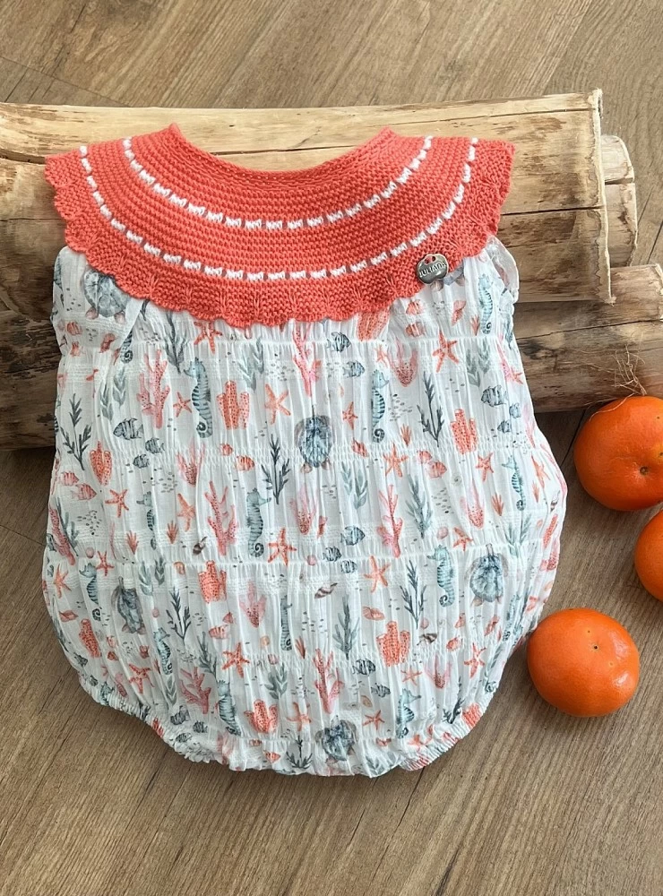 Unisex coral knit romper with printed fabric