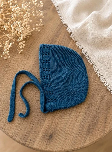 Unisex knitted baby bonnet in emerald green and dusty green