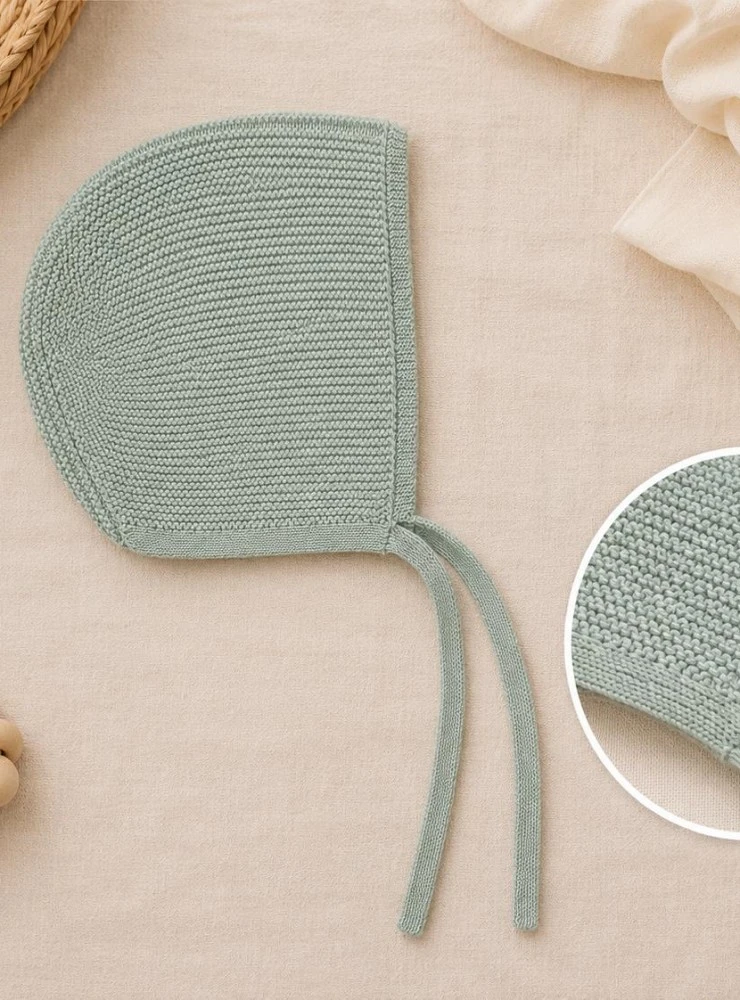 Unisex knitted bonnet in dusty green | Aller Collection