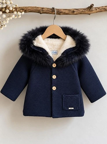 Unisex knitted duffle coat with a faux-shearling lining and a natural fur-trimmed hood.