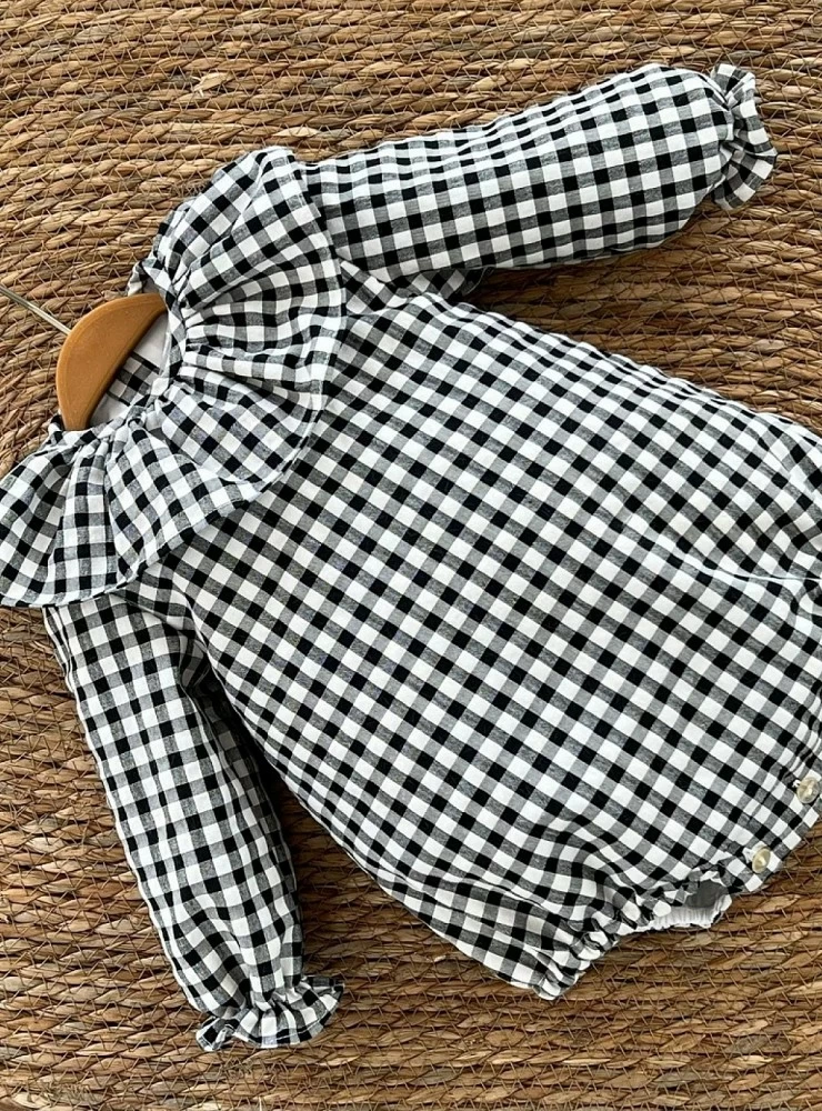 Unisex romper in black gingham box. Various sizes