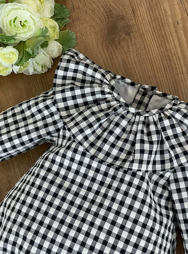 Unisex romper in black gingham box. Various sizes