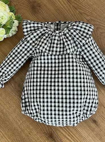 Unisex romper in black gingham box. Various sizes