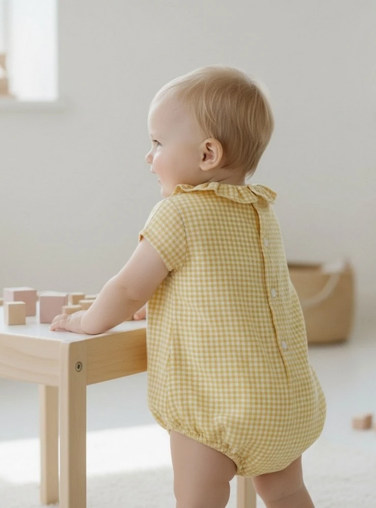 Unisex romper with caramel gingham check.