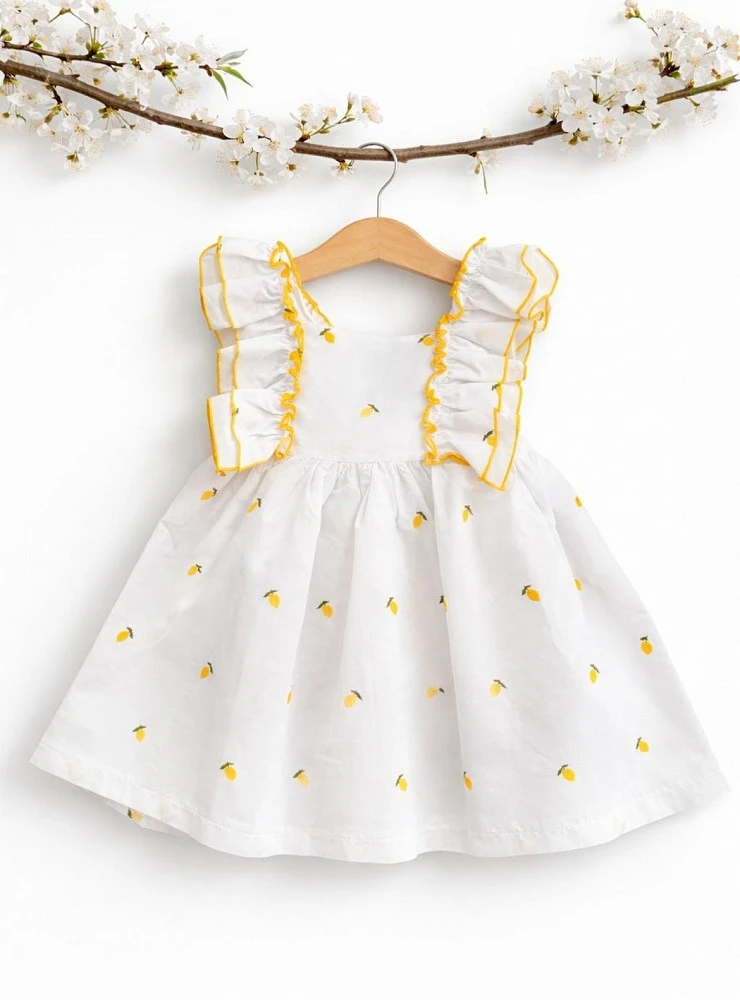 White and yellow dress from the Lemons collection
