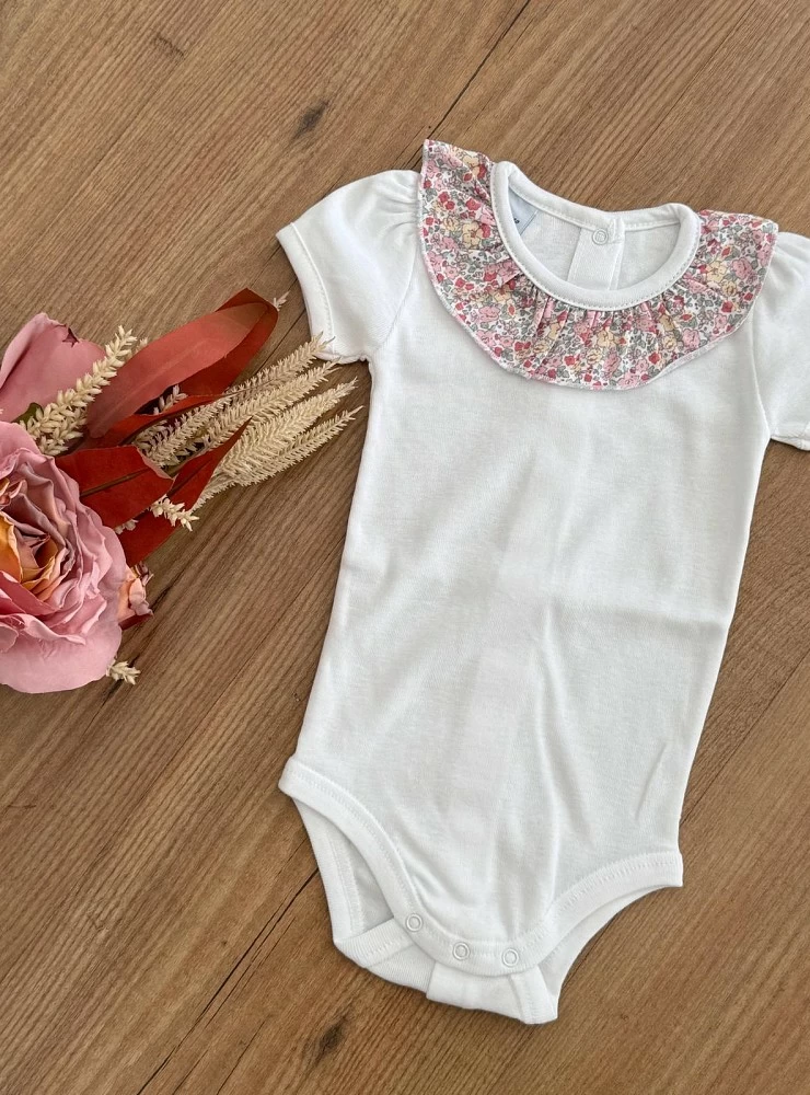 White cotton bodysuit with liberty ruffle collar