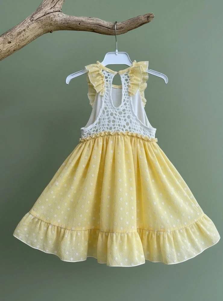 Yellow plumeti dress from the Pretty collection
