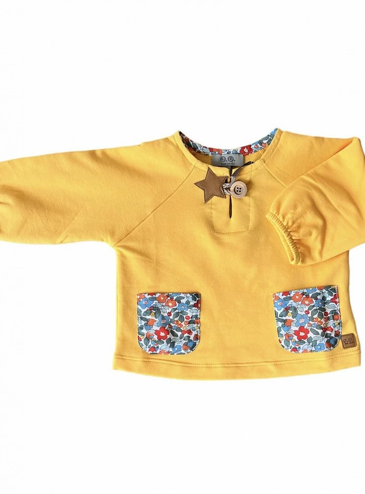 Yellow sweatshirt flower collection by José Varón